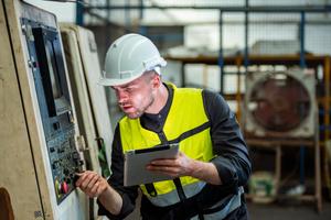 one professional engineer worker technician assistant in helmet inspection check old machine construction factory with colleague manager check old machinery production construction operating | OMC GROUP